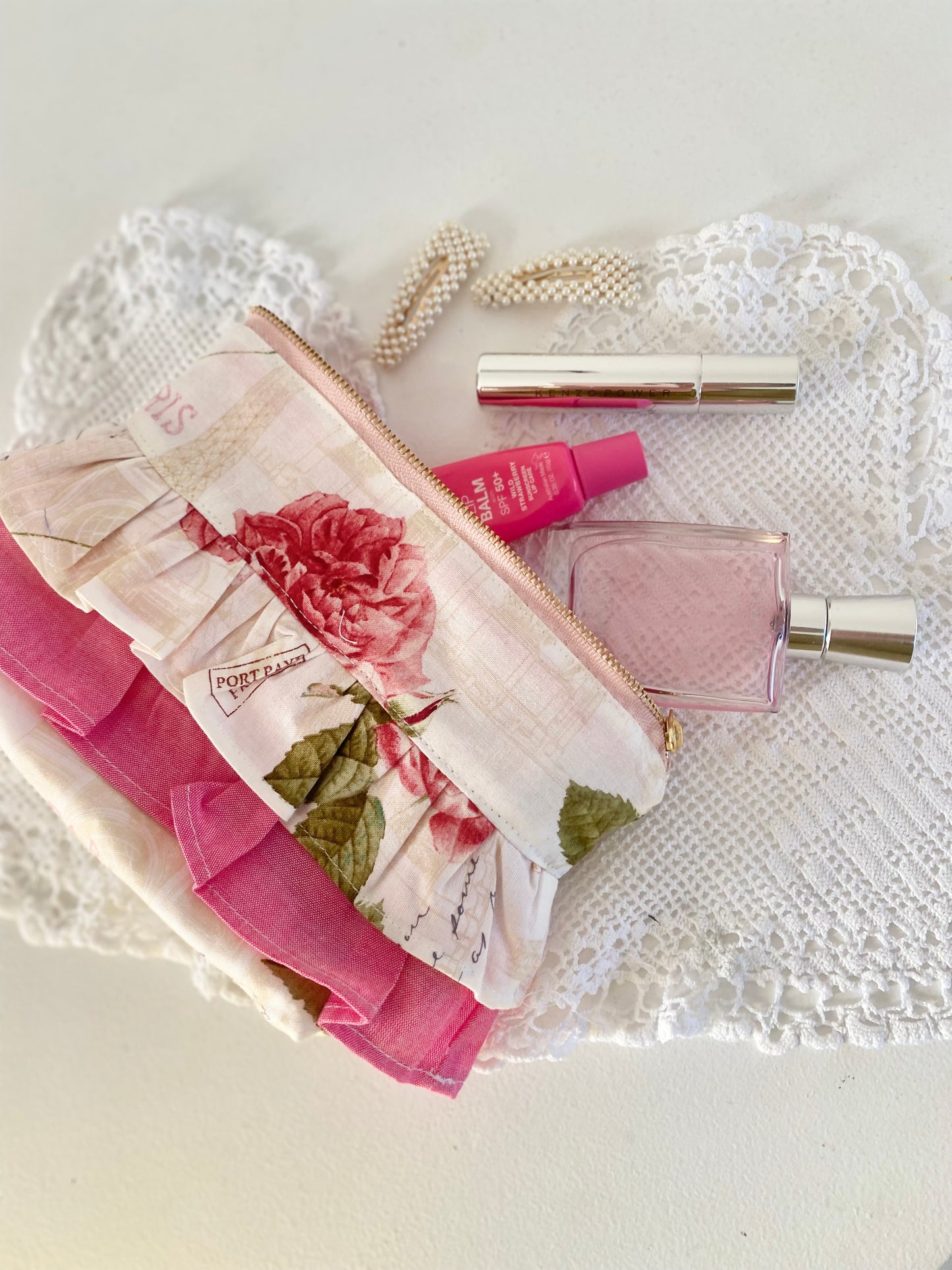 Pink frilled essential pouch