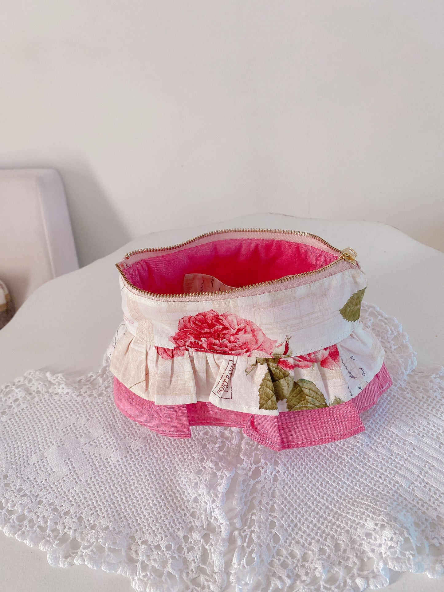 Pink frilled essential pouch