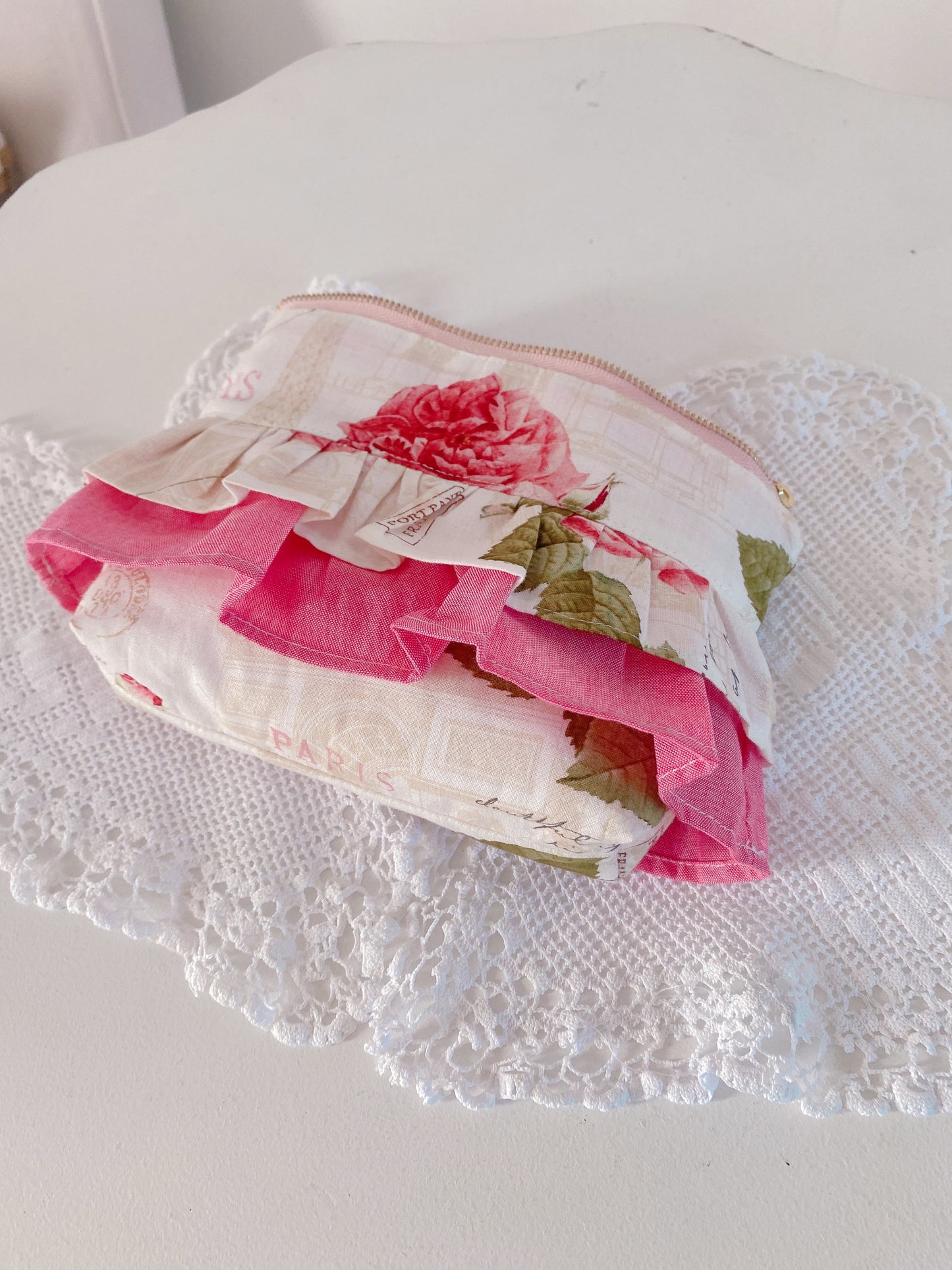 Pink frilled essential pouch